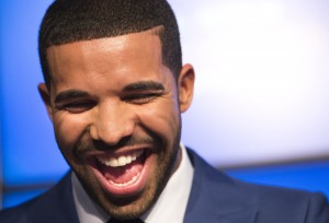 Drake smiles during an announcement that the Toronto Raptors will host the NBA All-Star game in Toronto